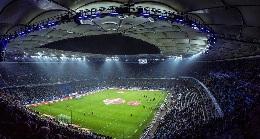 a large soccer stadium before a match at night